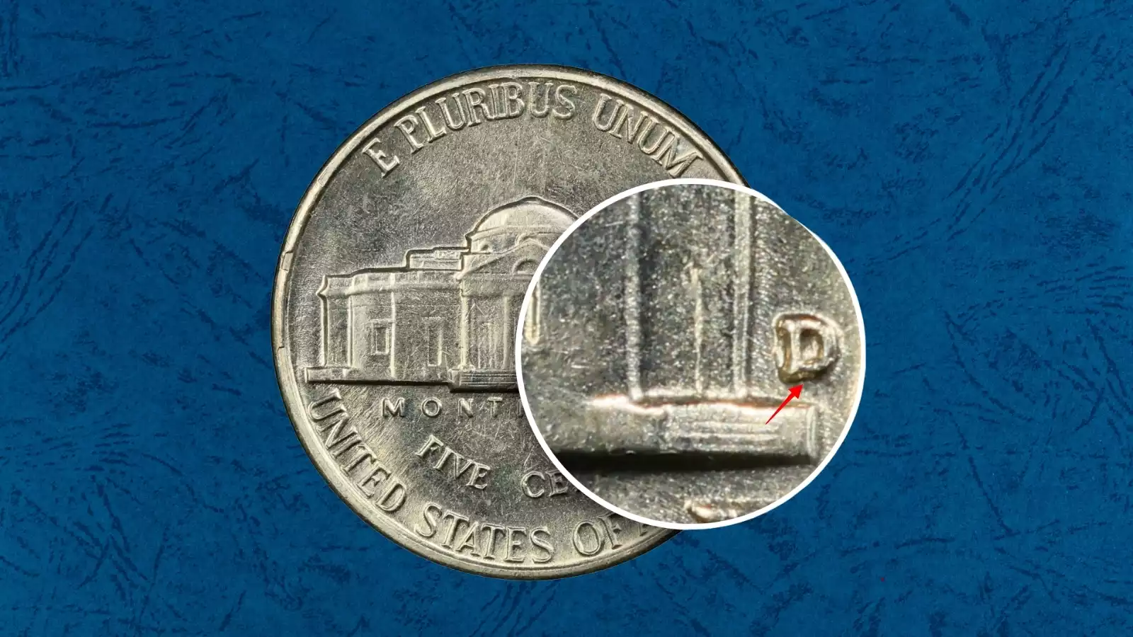 Close-up of 1958-D nickel D mint mark showing secondary inverted D impression RPM-005 FS-501 variety